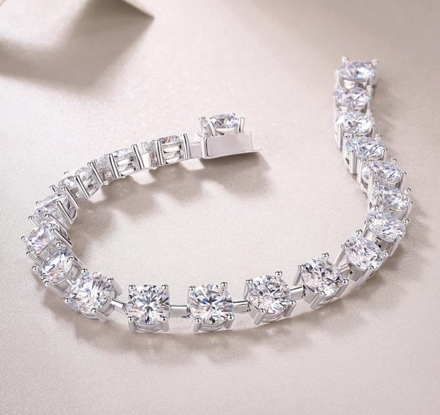 Moissanite bracelet with 20 brilliant cut 1 carat stones set in pure sterling silver.