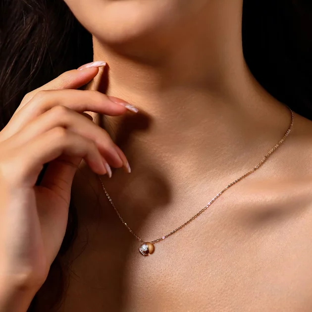 Moissanite Necklace Round (Brilliant) set in Gold.
