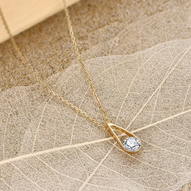Moissanite Necklace set in Gold.