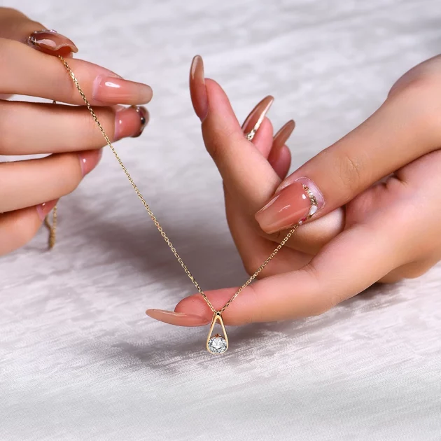 Moissanite Necklace set in Gold.
