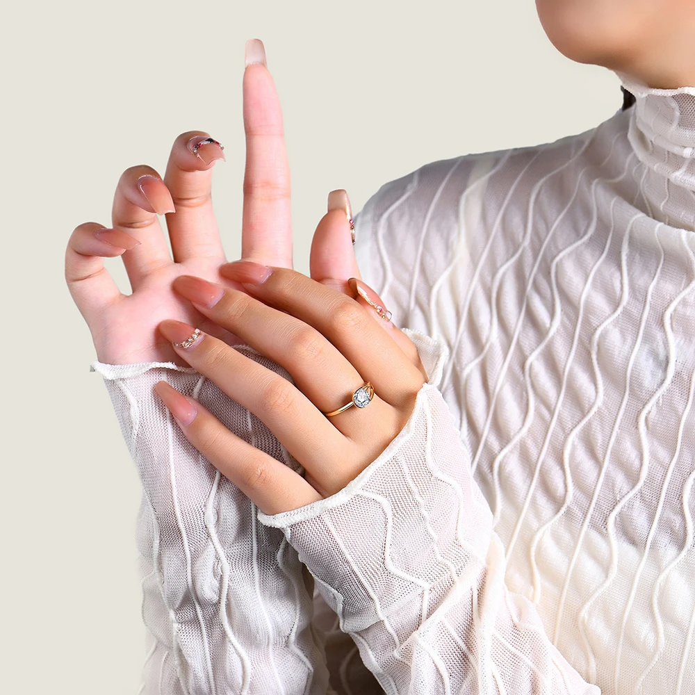 Sophisticated-Brilliant-Cut-Moissanite-Ring-in-Pure-Gold Sophisticated Brilliant Cut Moissanite Ring in Pure Gold